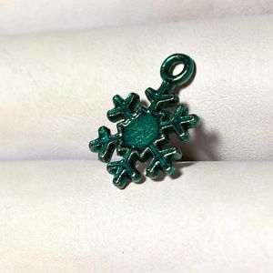 Green and silver tone snowflake charm. #bme2120
